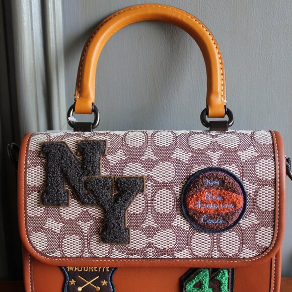 NWT Rogue Top Handle in Signature Textile Jacuard with Varsity Patches. - Picture 2 of 14